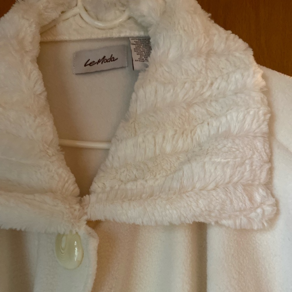 Cream colored cape